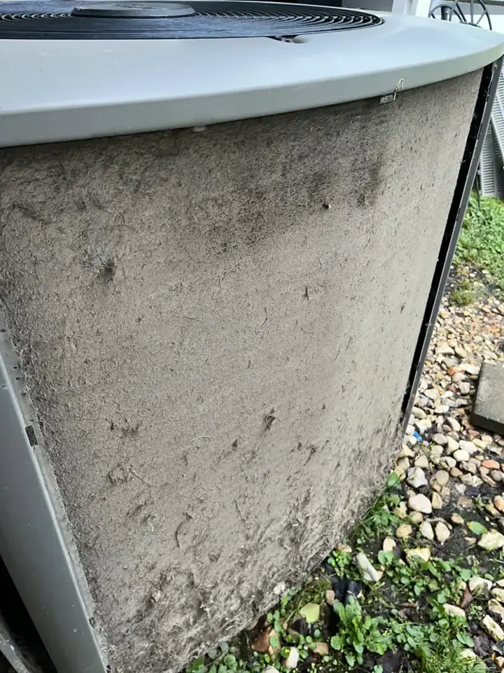 Condenser coil packed with dirt and debris, Covington