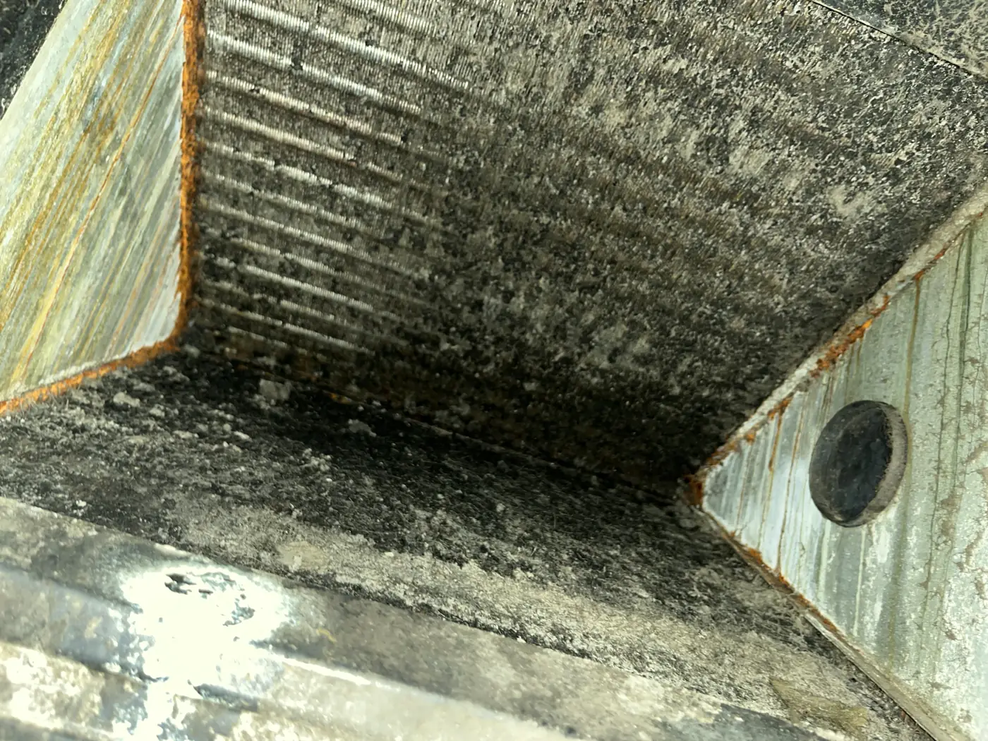Indoor evaporator coil coated with dirt and buildup, Slidell